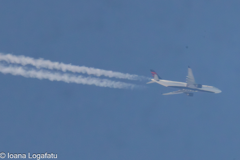 Majestic aircraft gliding through a brilliant sky